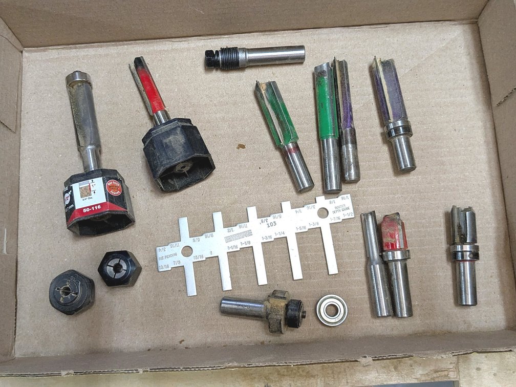 Several router bits with 1/2" shanks.  Largest is 4-1/2" long.
