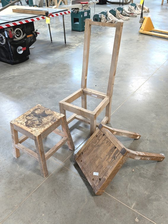 Three rustic wood chair frames up to 4" tall.