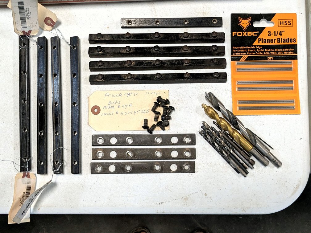 8" jointer blade clamps and 3-1/4" planer blades.