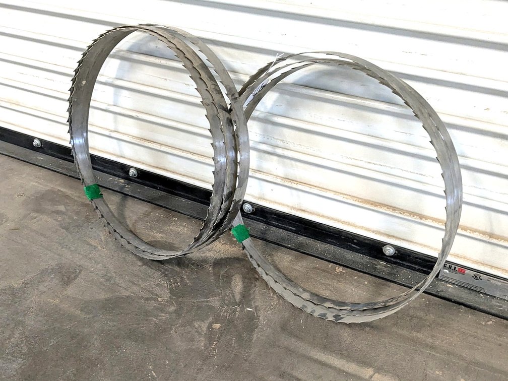 Pair of saw blades, each spool measures 16-1/2" wide x 1-1/4".