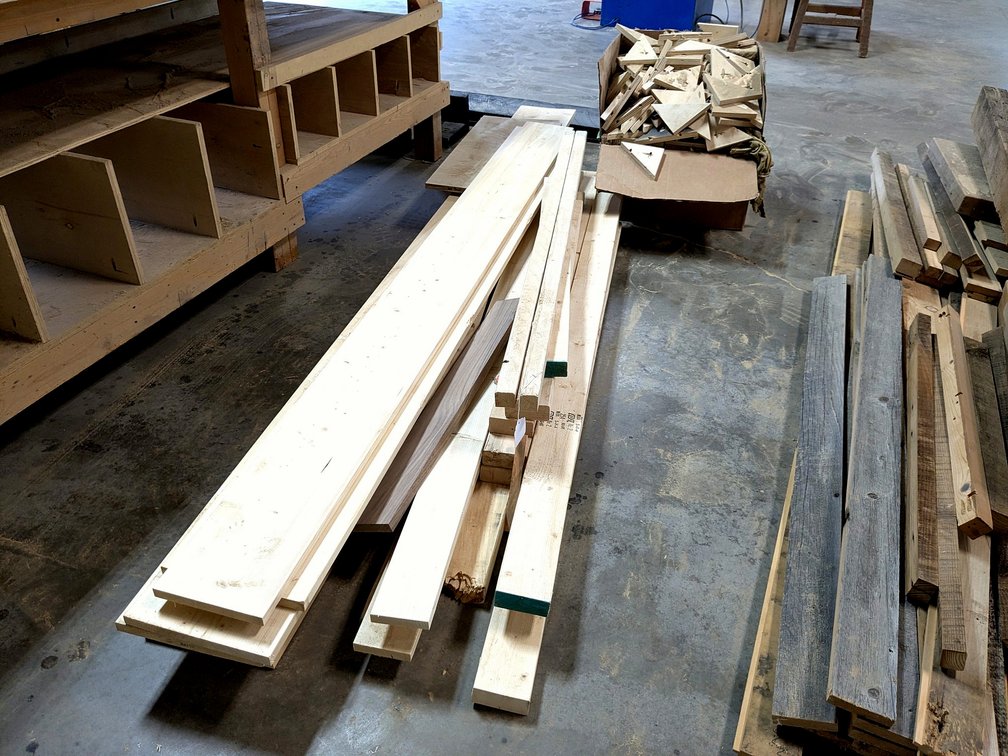 Pine and black walnut boards up to 9' long and 9" wide.