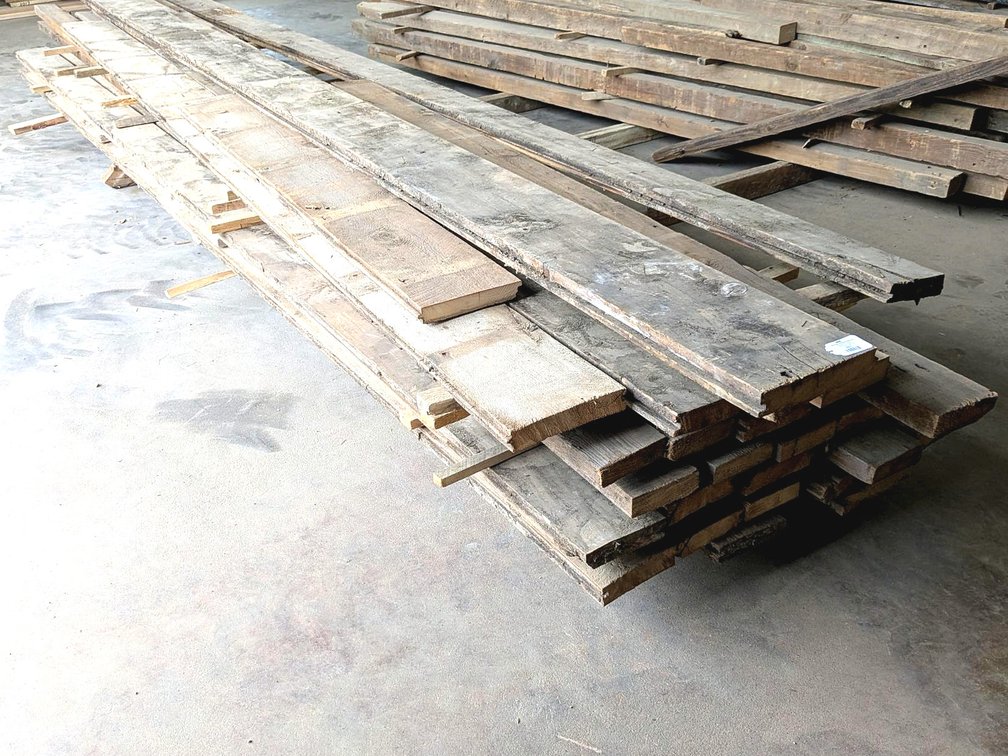 Rustic boards and planks up to 18' long and 9" wide.