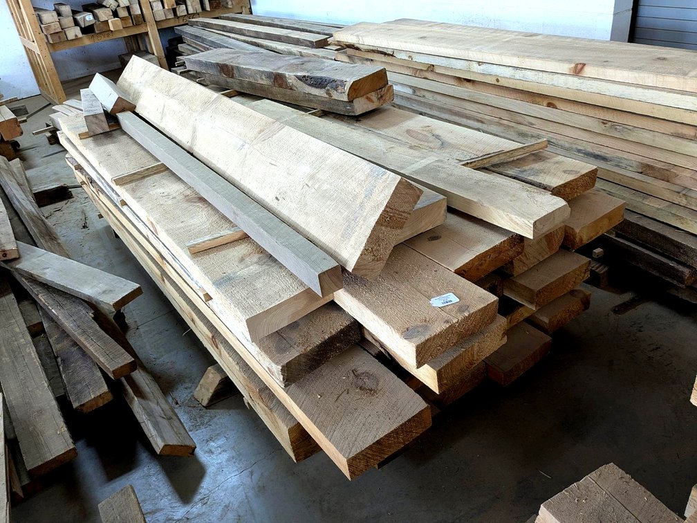 Rough sawn planks up to 10" wide and 3" thick and over 9' long.