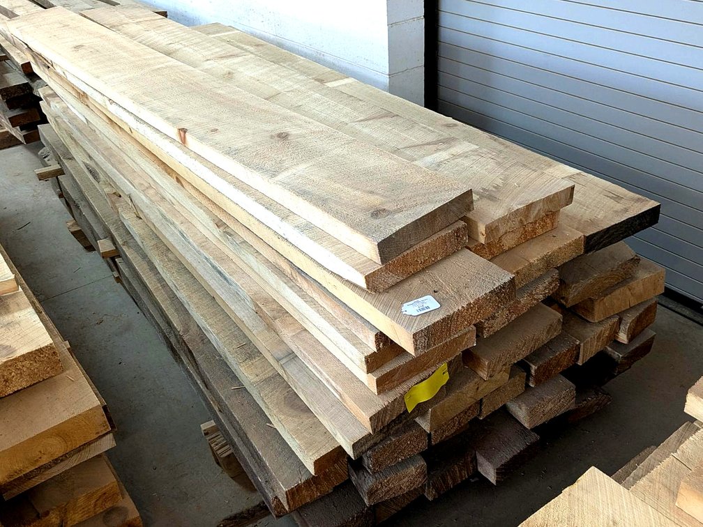 Rough sawn planks up to 10" wide and 3" thick and 9' long.