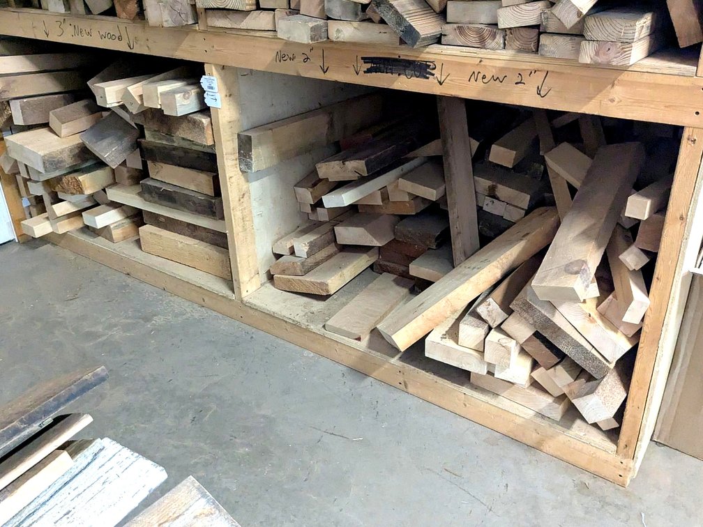 Rustic rough sawn lumber pieces up to 10" wide and 3" thick and 45" long.