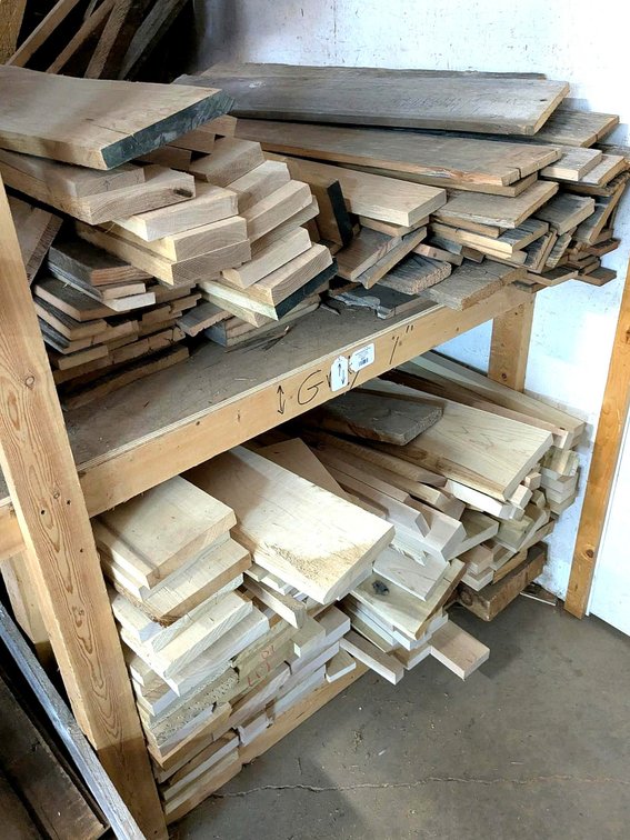 Oak, maple, and other boards including barn board and others.  Largest is 10" wide x 3" thick, and p