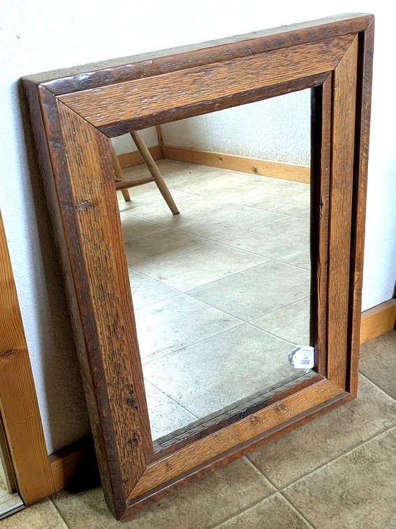 Rustic wooden framed mirror, measures 22" x 28" over frame.