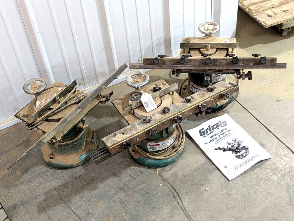 Three Grizzly universal knife grinders for parts or repair are Model G2790.