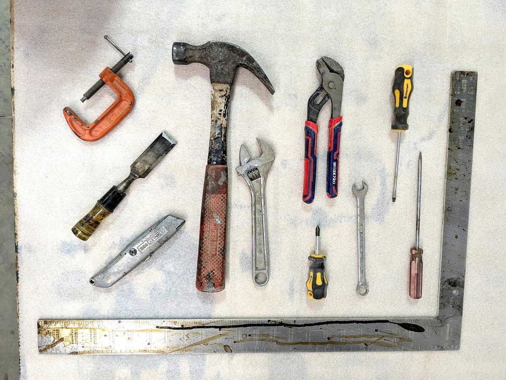 Johnson framing square, Stanley knife, Craftsman wrench and more.