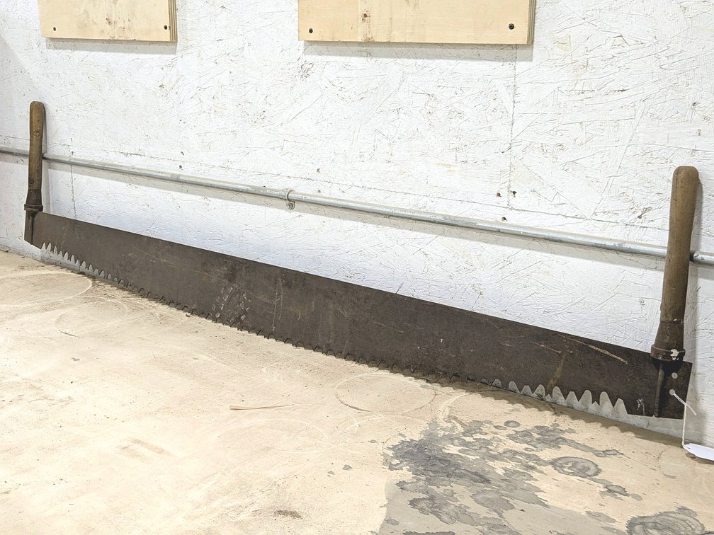 Antique two man cross cut saw is 5-1/2'.
