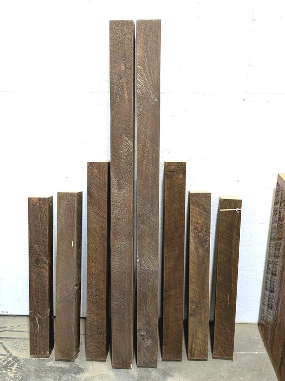 Eight pieces of 4'x4' up to 5' long - would be good as table legs, braces or other.