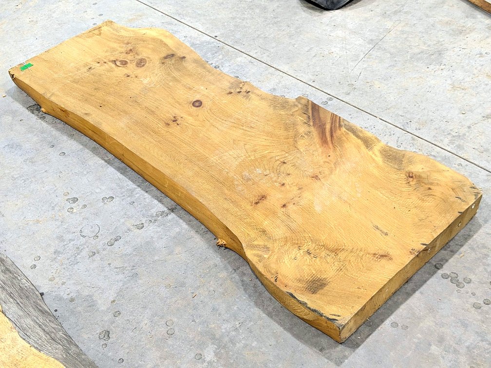 Double sided live edge pine slab measures 59" x 21" x 2-1/2" thick.