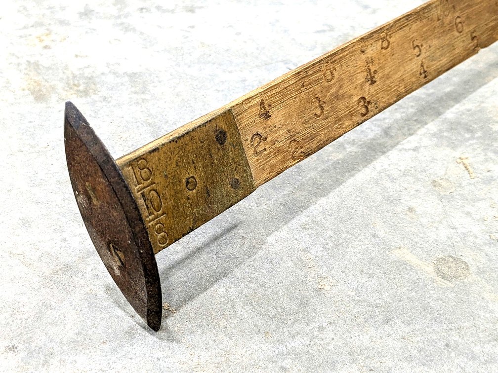 Antique log scale measures 3' long and has the original brass fitting.