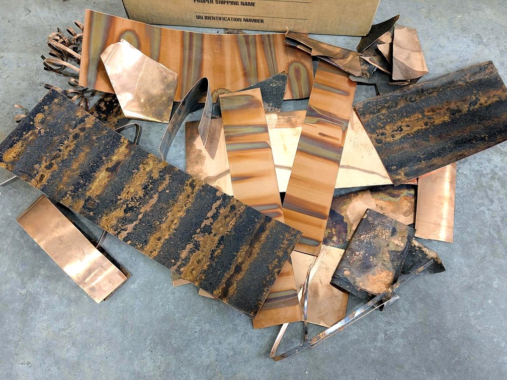 Several pieces of decorative copper sheet up to 18" long.