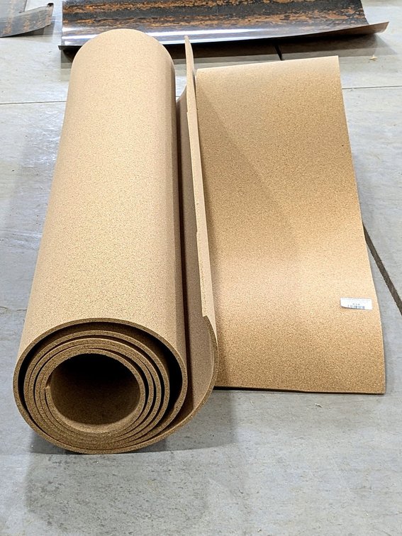 Roll of 1/4" cork is 49" wide and spool 9" diameter as pictured, plus a smaller piece.