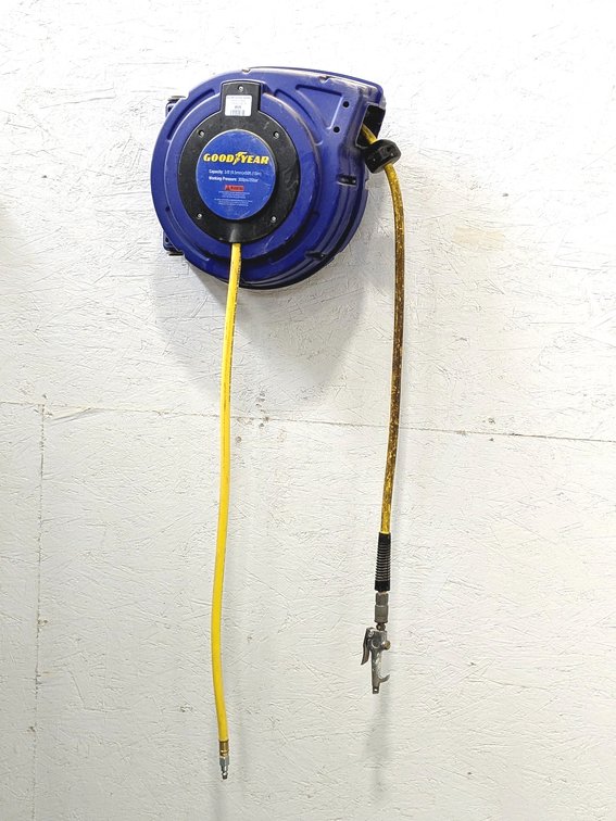 Goodyear air hose reel with 3/8" hose and ends.