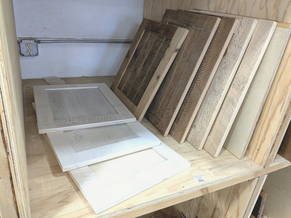 Rustic wooden cabinet doors up to 22" tall.
