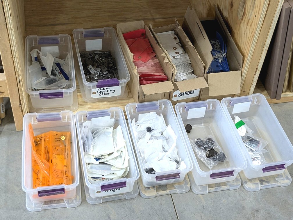 Cabinet hardware including hinges, leveling clips, screws, shop tags and more.