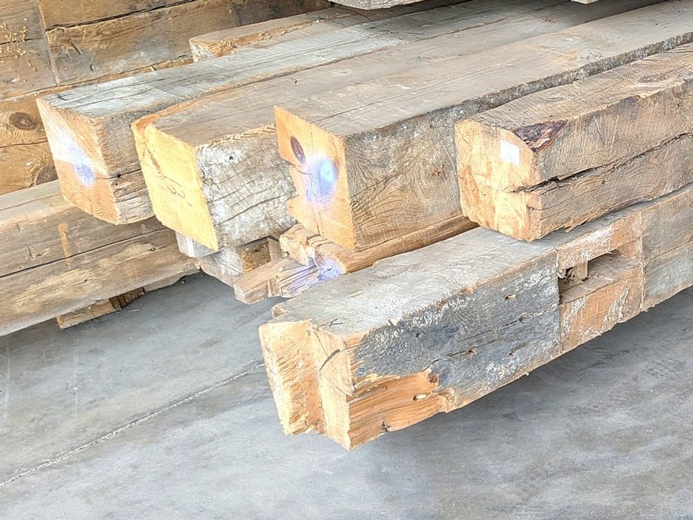 Hand hewn barn beams up to 8x8 and longest is about 16'.