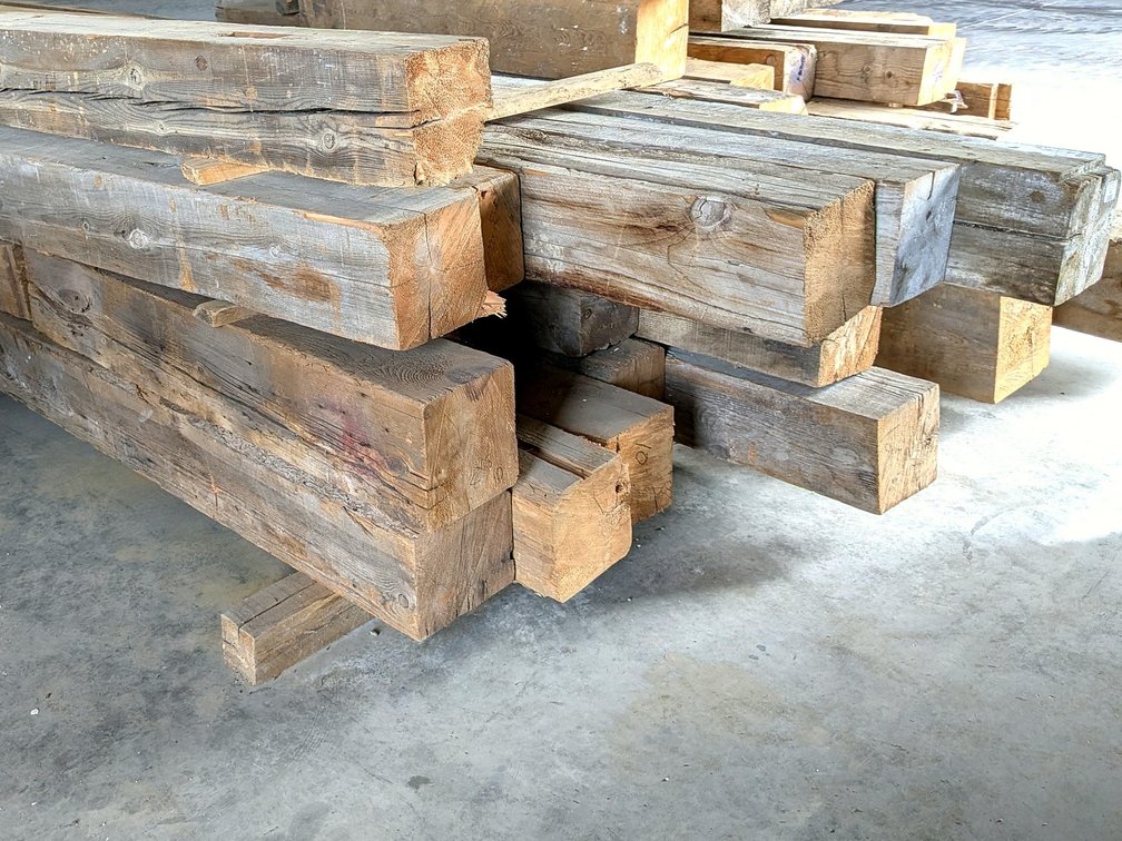 Sixteen hand hewn barn beams are 8x8 and up to 15'.