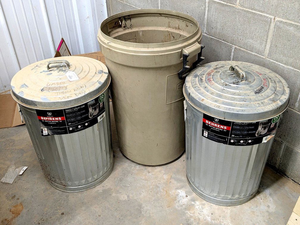 Three Rubbermaid and other garbage cans up to 30" tall.