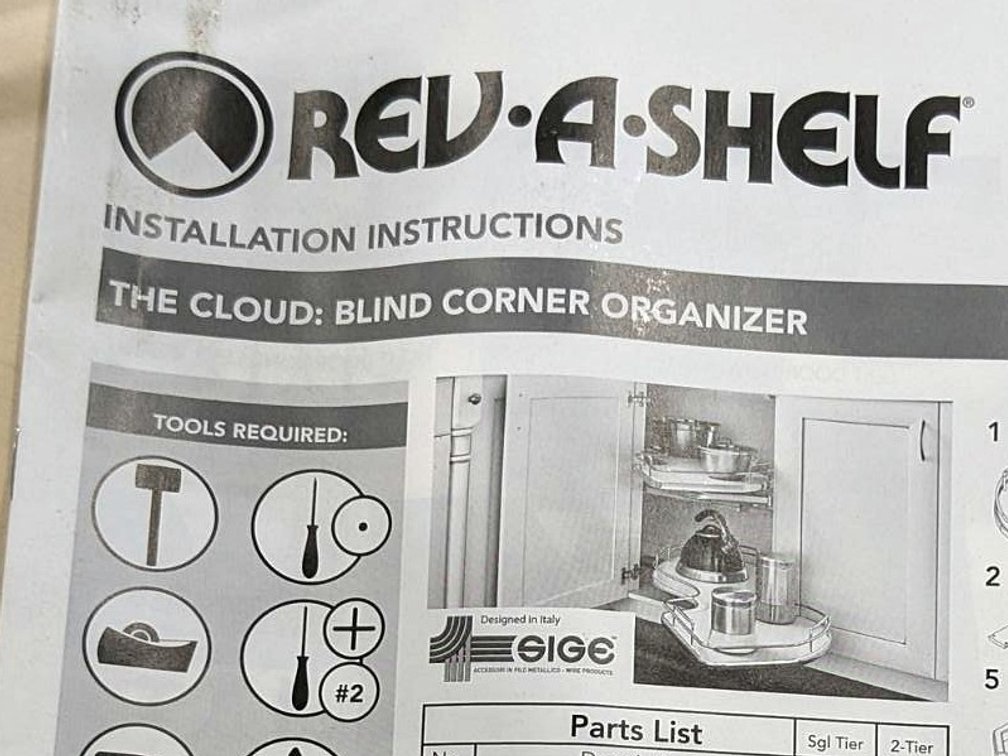 Rev-A-Shelf Maple Cloud corner cabinet kit with a 36" shelf.  Google model number for specs.