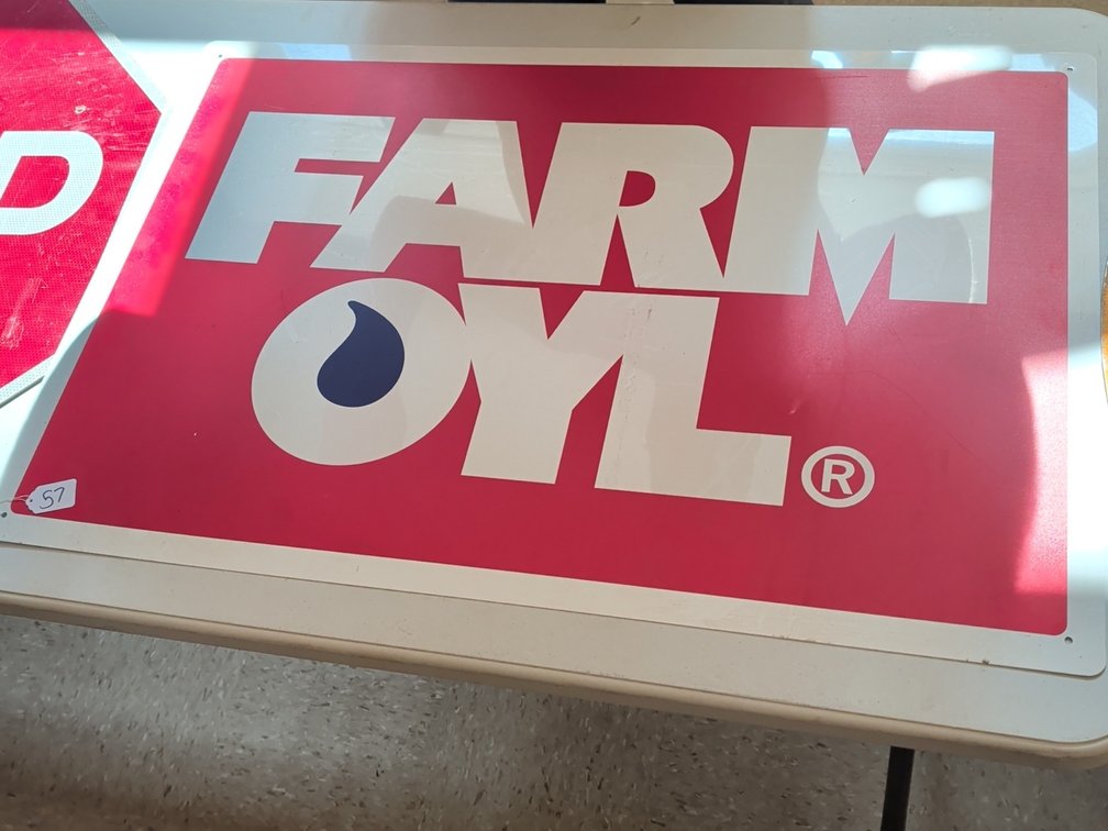 Farm Oyl tin sign