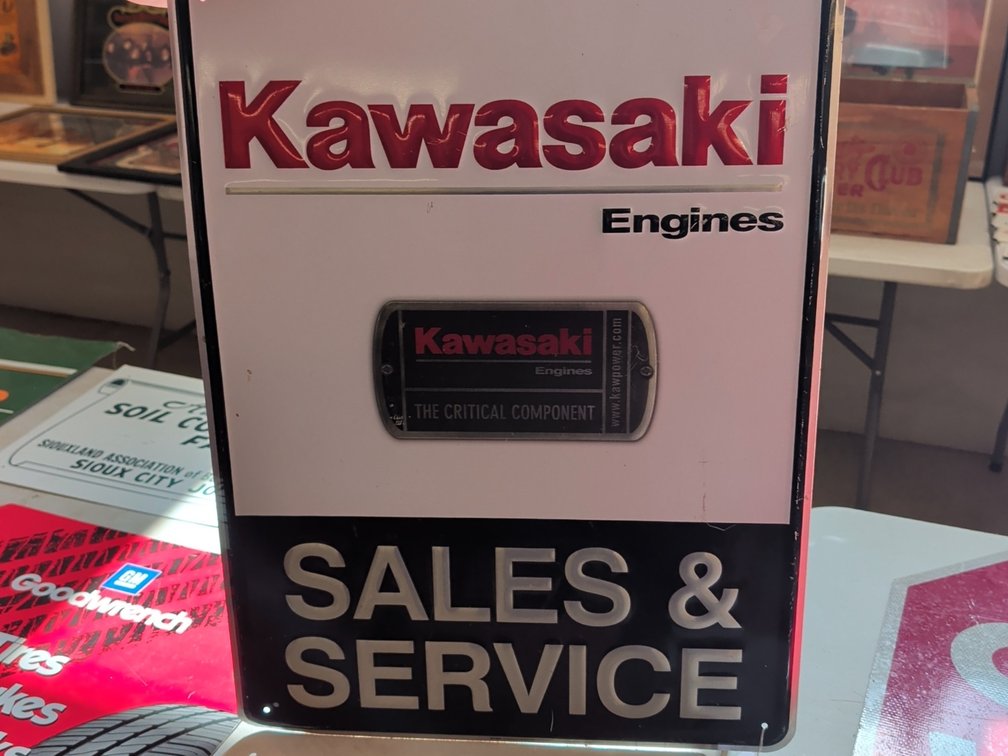 Kawasaki Sales & Service sign