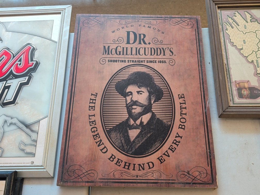 Dr McGillicuddy's wood sign