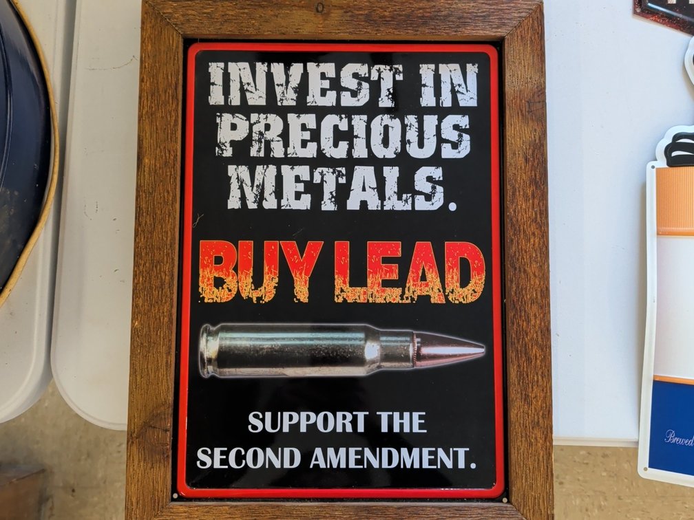 Invest in Precious Metals sign