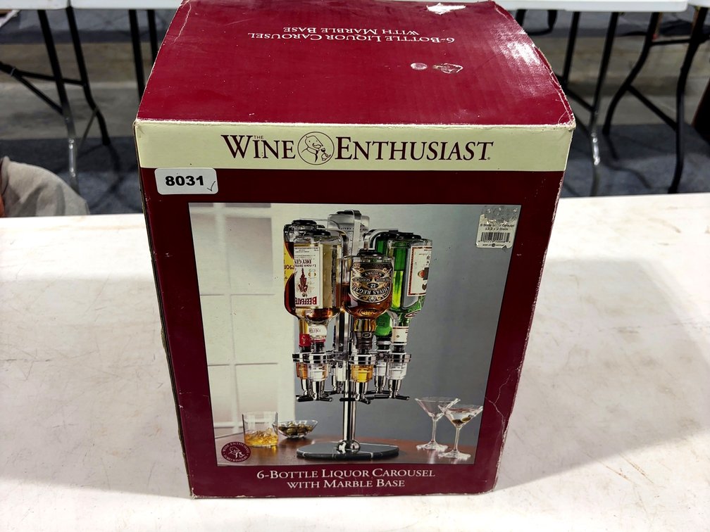 Unused (6) Bottle Liquor Carousel with Marble Base by The Wine Enthusiast