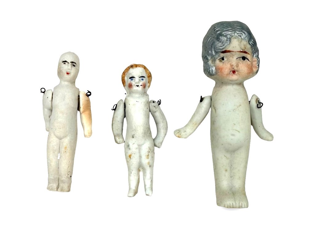 Three Miniature Bisque Wire-Jointed Dolls