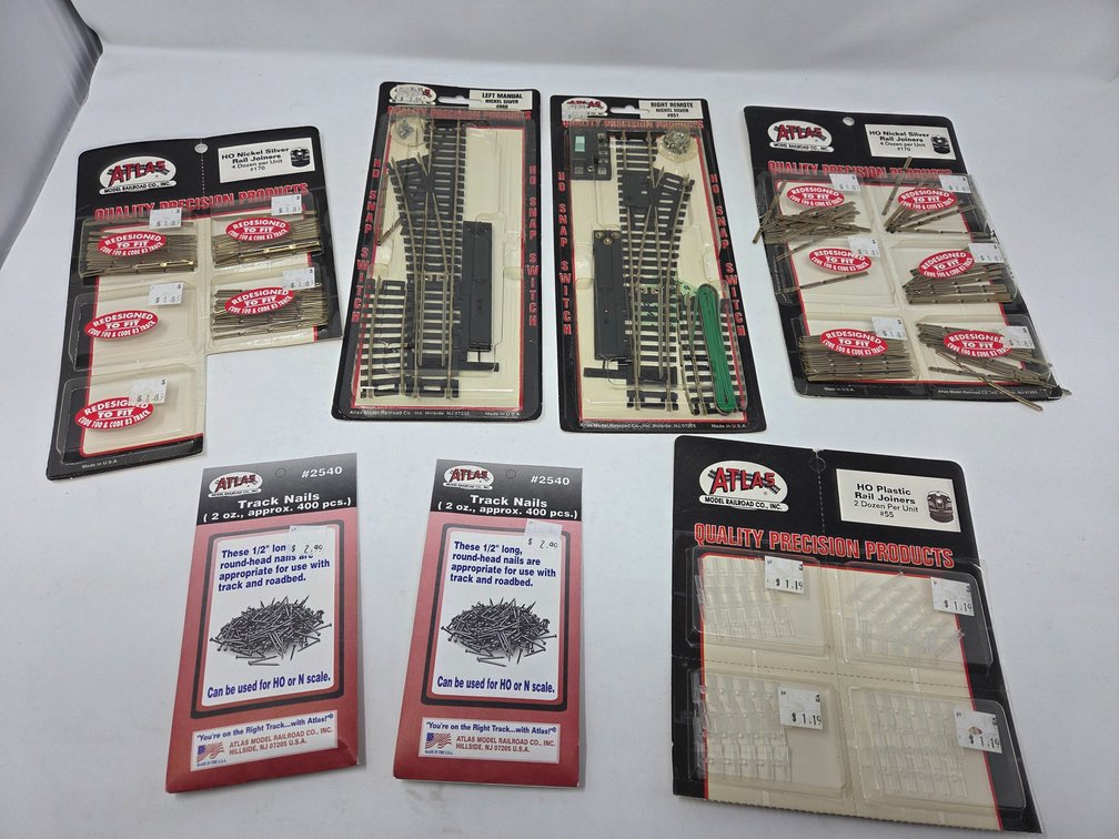 7 Ho Scale Assortment of Tracks and Rail Joiners Nails (some missing)