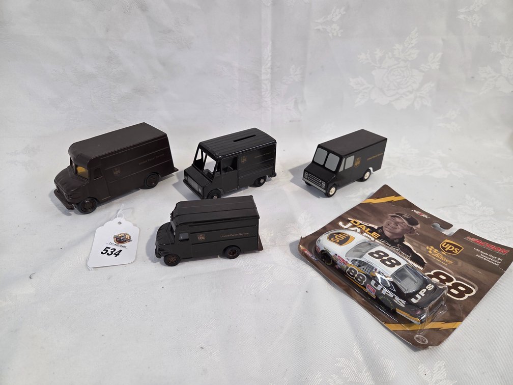 4-UPS Trucks and UPS Dale Jarrett Car