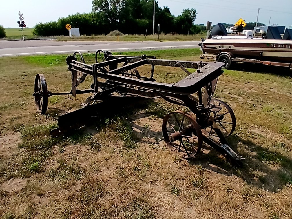Antique Road Grader on Steel Wheels