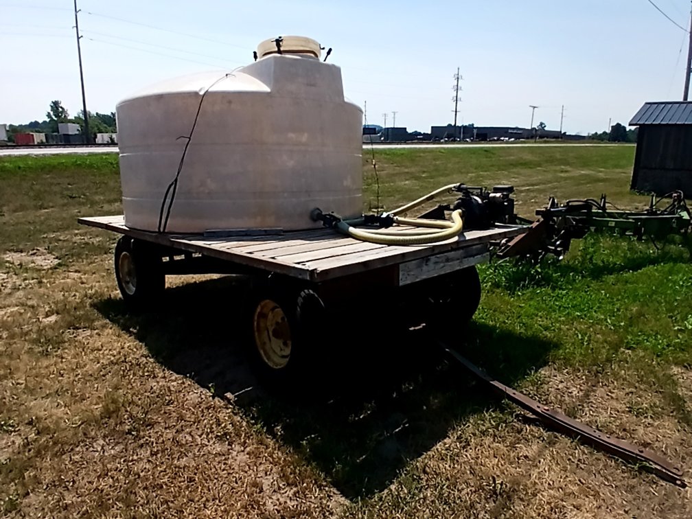 Gal Tank & Teansfer Pump on Flat Rack with JD Running Gear