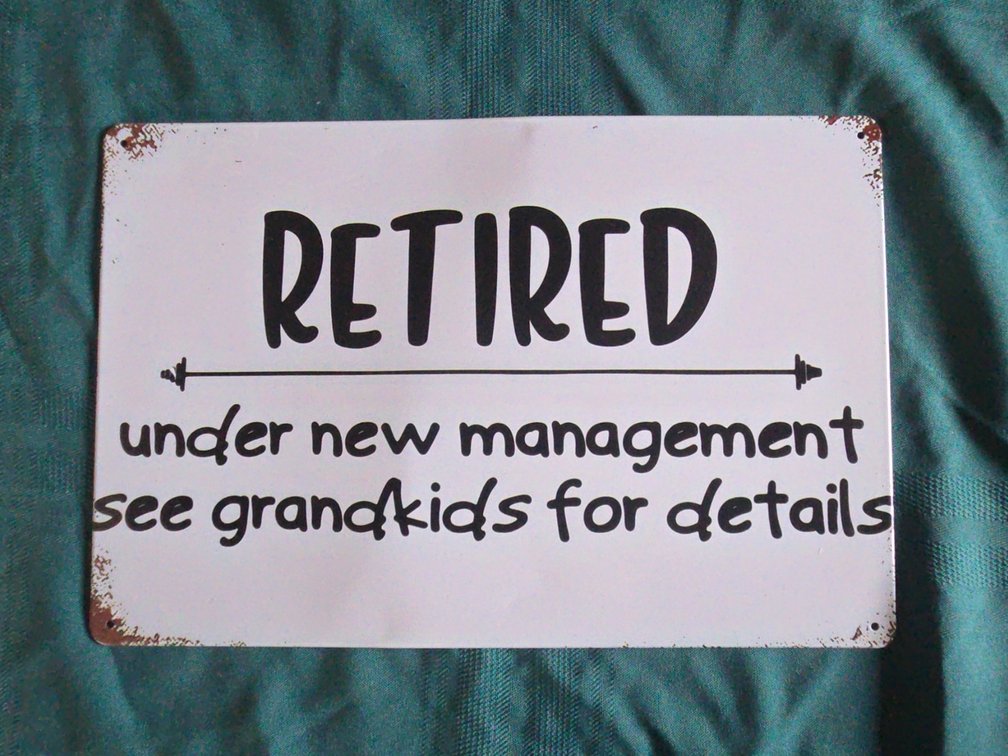 Retired Metal Sign