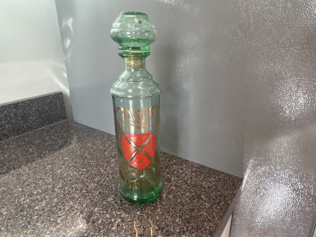 Green Glass Decanter with Stopper and Gilt Crest