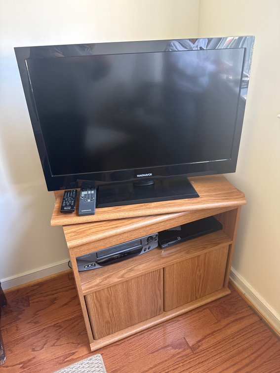 Flat-Screen Television, Media Stand, VCR, and DVD Player