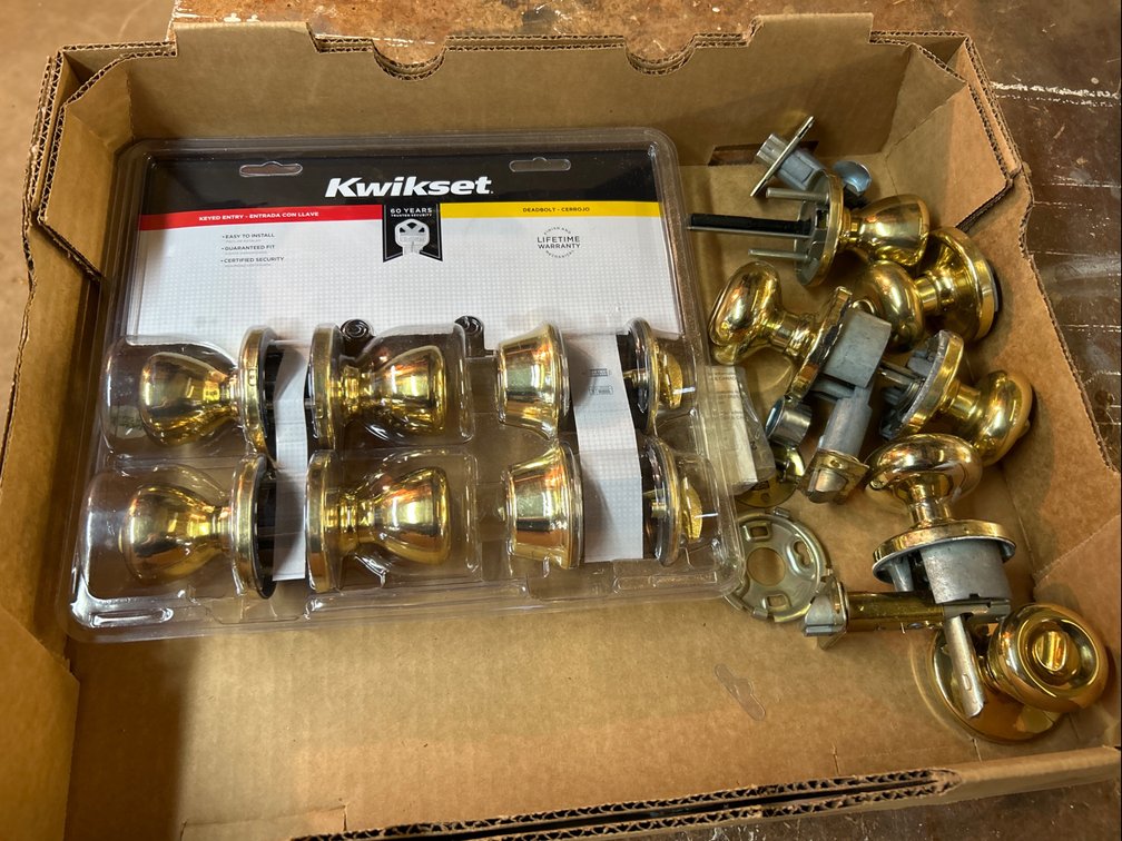 Box Lot of Kwikset Door Handles and Dead Bolt