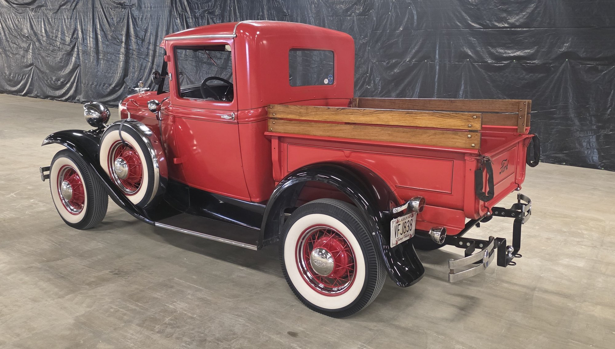 1931 Ford Model A Budd Cab pickup, driver's side profile, for sale at Swafford Auction Group