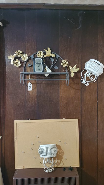 Shelf Hanging on Wall with Contents