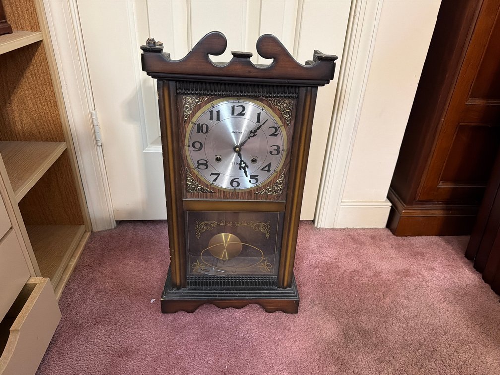 Alaron C-24/A mechanical pendulum wall clock.