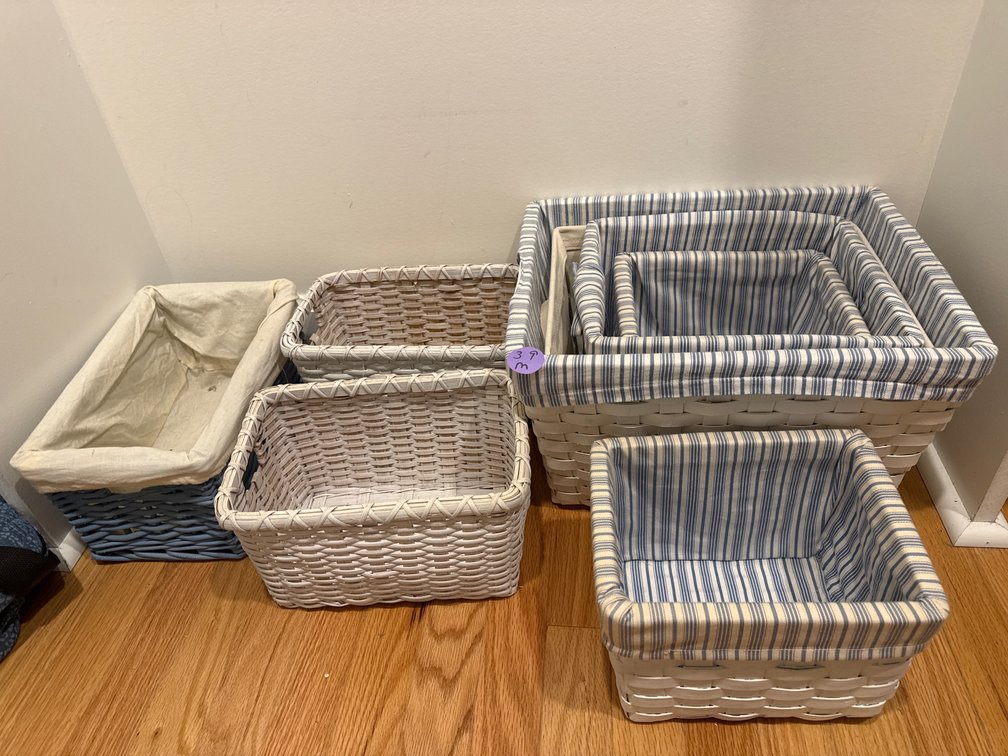 Lot woven baskets, some covered with fabric. 7 total