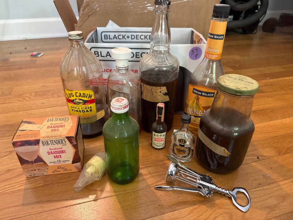 Old Apothecary Like Bottles and Wine Key
