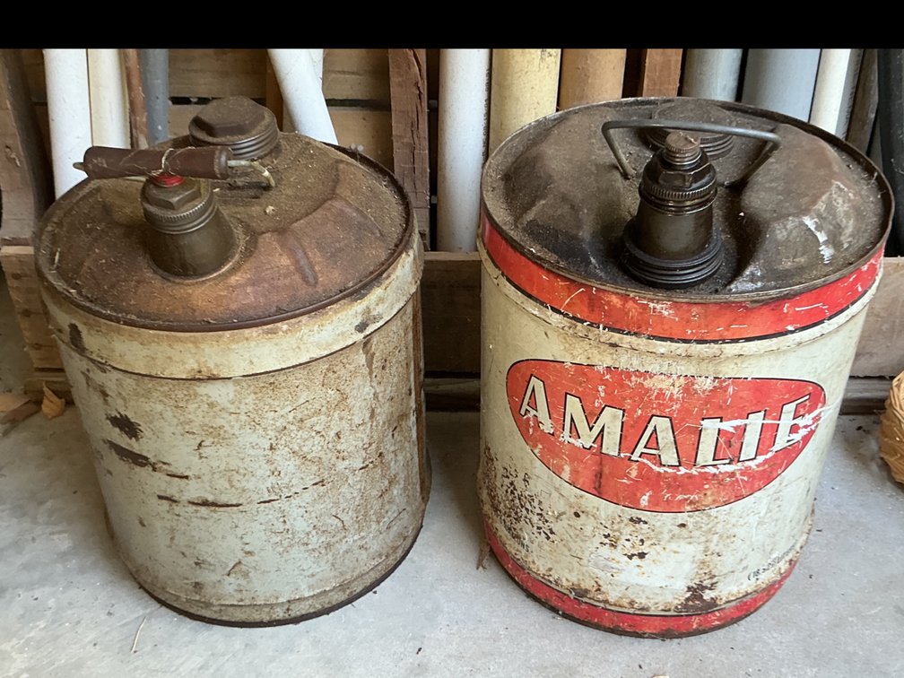 2  Oil or Gas Cans: Amalie Oil & Unmarked