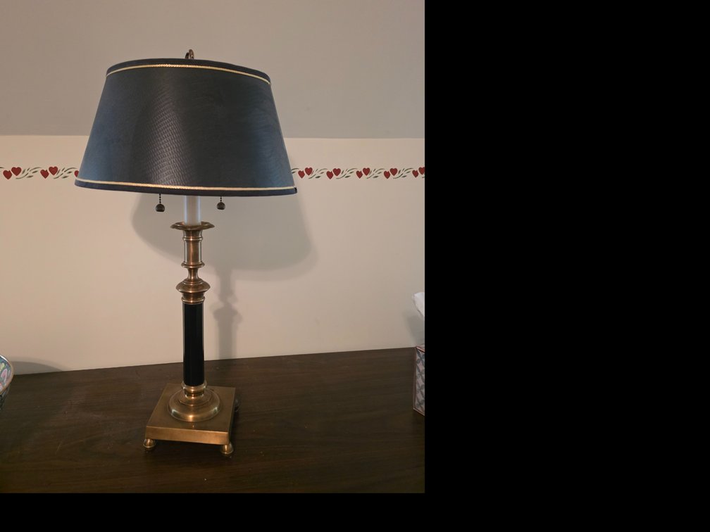 Brass and black column table lamp with a dark, textured shade and dual pull chains