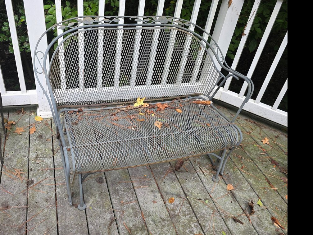 Wrought-iron mesh patio settee or high-back Glider