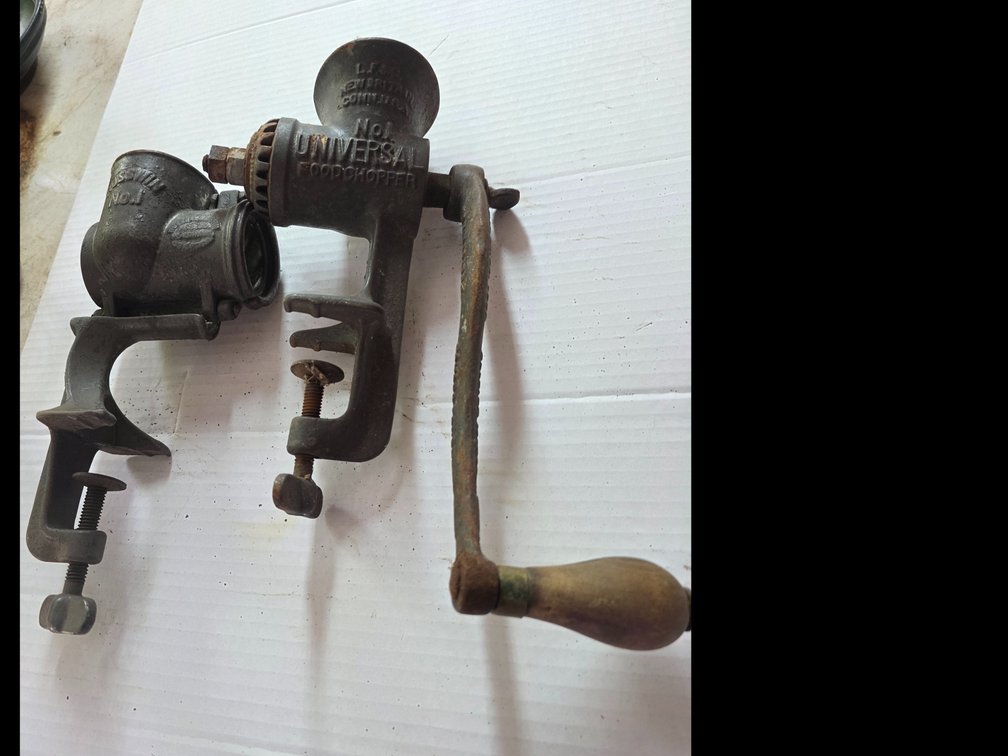 Vintage Universal No. 1 Food Chopper hand-crank meat grinder made by Landers, Frary & Clark (LF&C).:vintage Russwin No. 1 Meat Grinder body made of cast iron by the Russell & Erwin Manufacturing Company