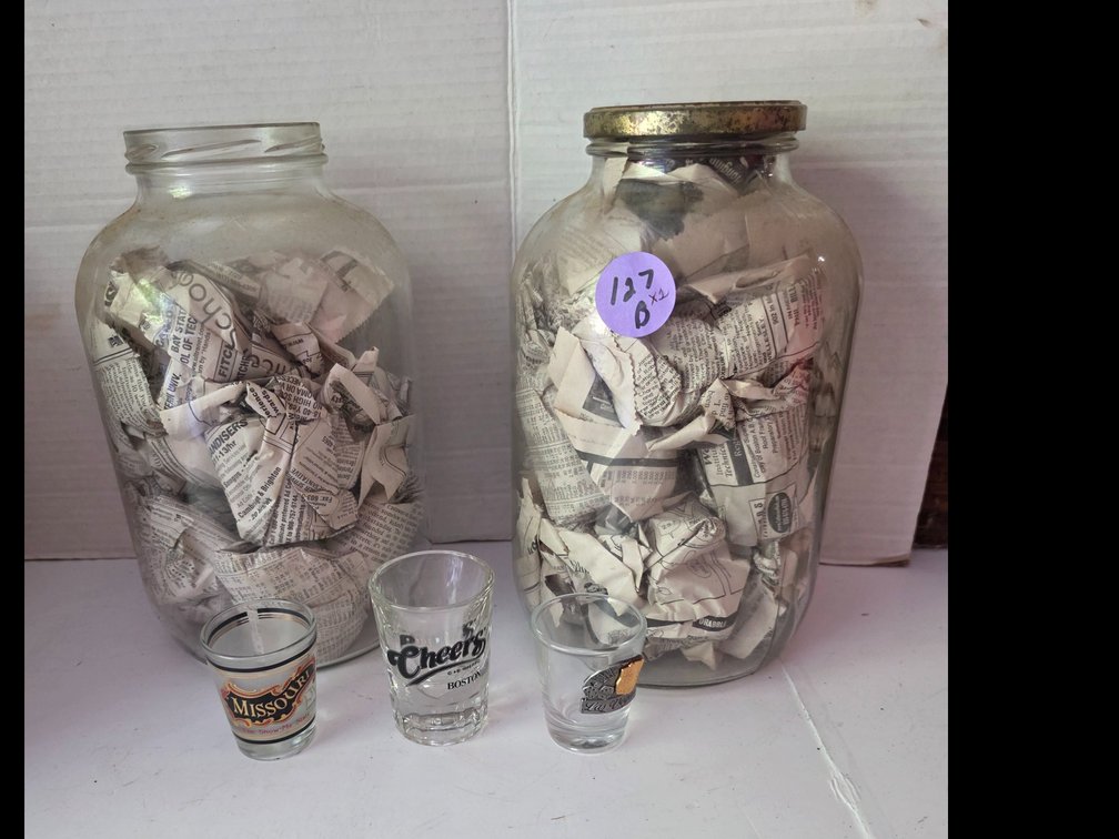 Gallon Jars filled with Shot Glasses